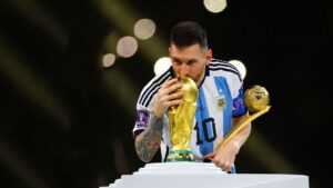 Messi Kissing World Cup Wallpaper