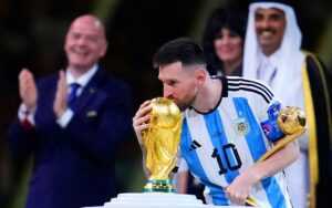 Messi Kissing World Cup Wallpaper
